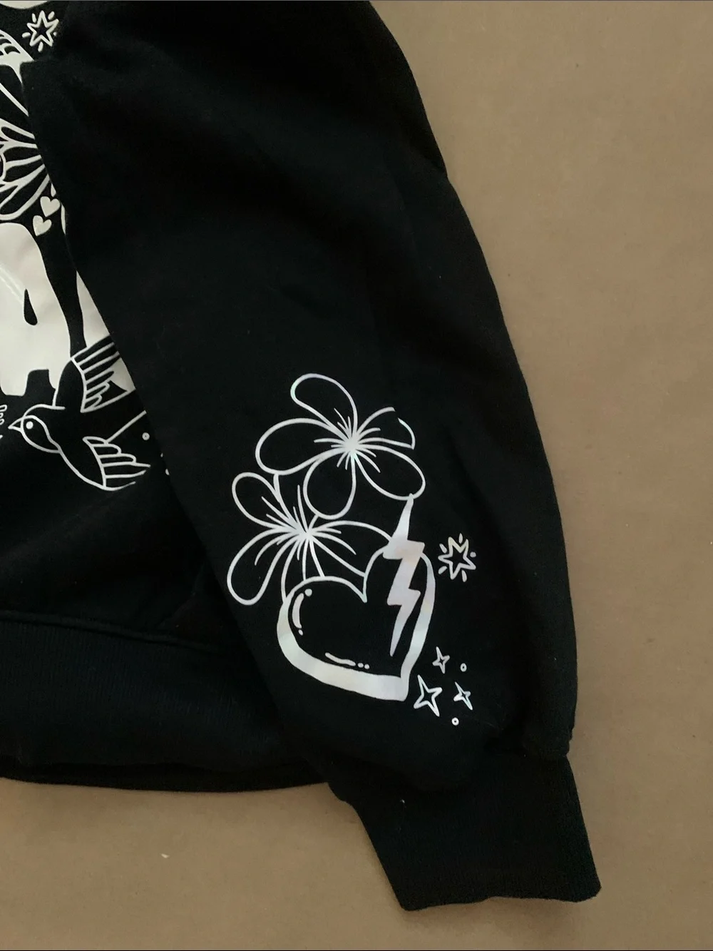 Justice Black Sweatshirt with White Peace Graphic